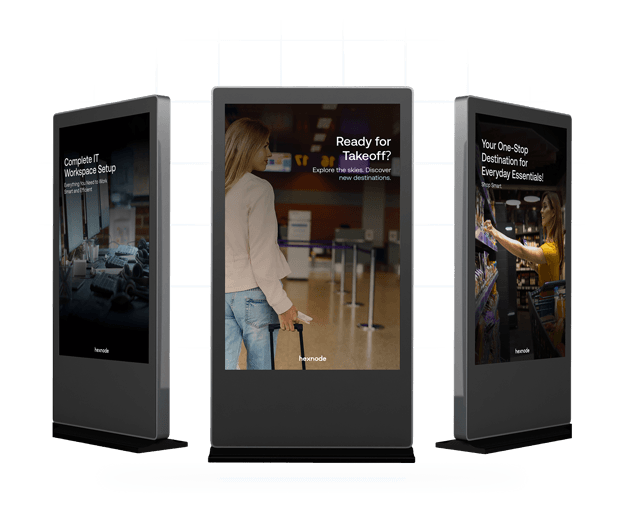Three digital signage displays showing promotional content, including messages about IT setup and travel
